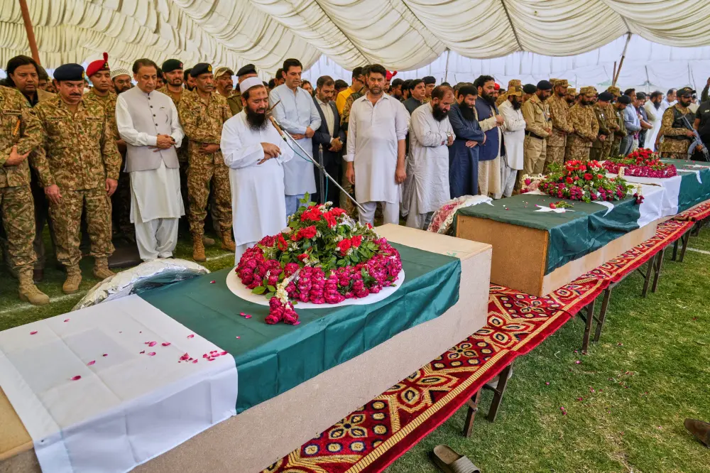 Pakistan army soldiers and others offer funeral prayers to the victims of Indian missile strike | AP