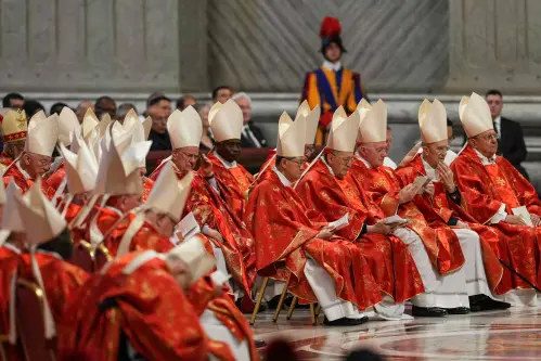 Focus on Sistine Chapel chimney as cardinals begin second day of papal voting
