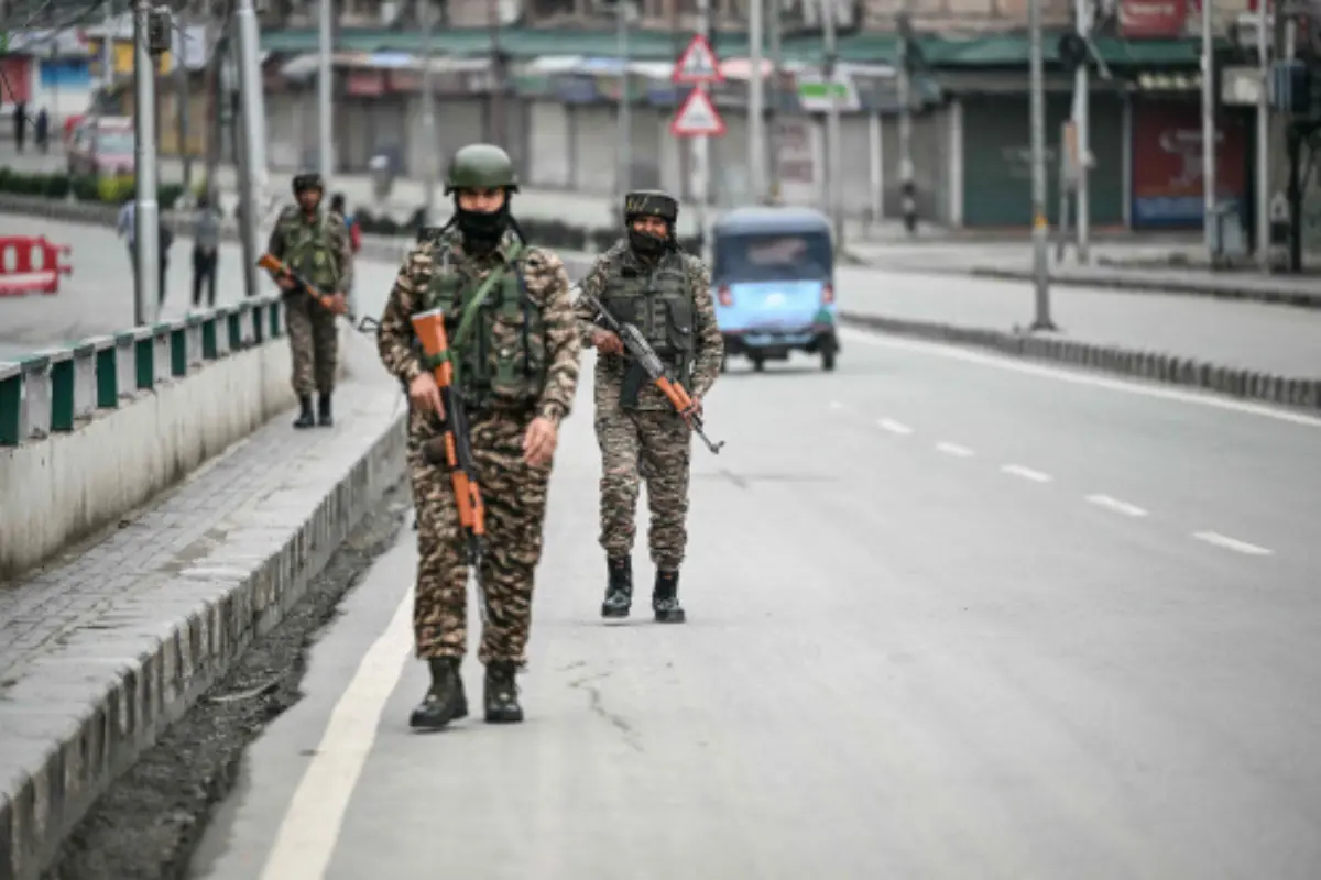 Indian paramilitary soldiers patrol along a road in Srinagar on May 10, 2025. Pakistan's military on May 10 said India launched another wave of missiles targeting three air bases -- including one on the outskirts of the capital -- as the conflict between the nuclear-armed neighbours spiralled toward full-blown war. | Photo: AFP