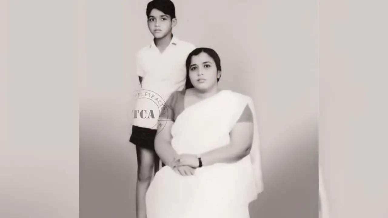 Photograph shared by Mohanlal on Mother's Day: A young Mohanlal with his mother, Santhakumari | Photo: Instagram