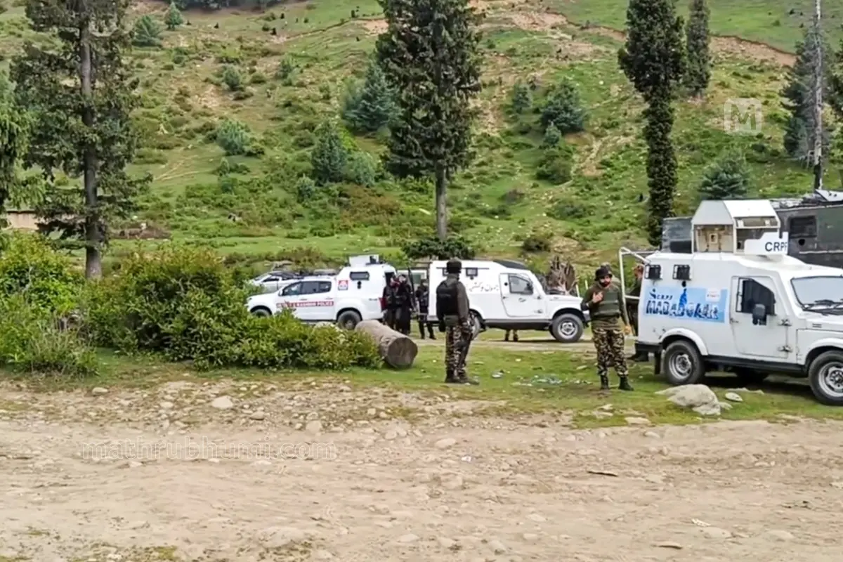 Security forces personnel during an encounter with terrorists in Shopian