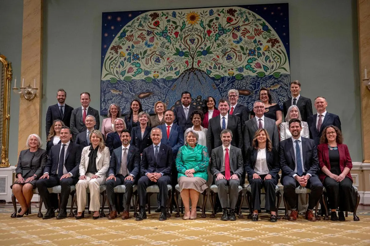 Canadian Prime Minister Mark Carney and his cabinet sit for a photo at Rideau Hall after the cabinet's swearing-in ceremony (Photo: AFP)