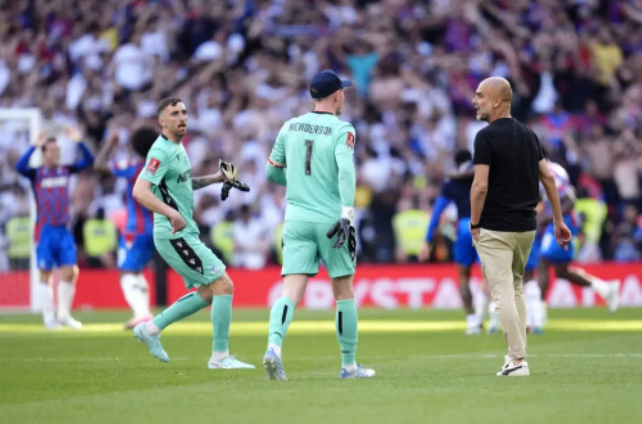 Manchester City manager Pep Guardiola addresses Crystal Palace goalkeeper Dean Henderson as teammate Matt Turner steps in following the FA Cup final between Manchester City and Crystal Palace at the Wembley Stadium in London. | Photo: AP
