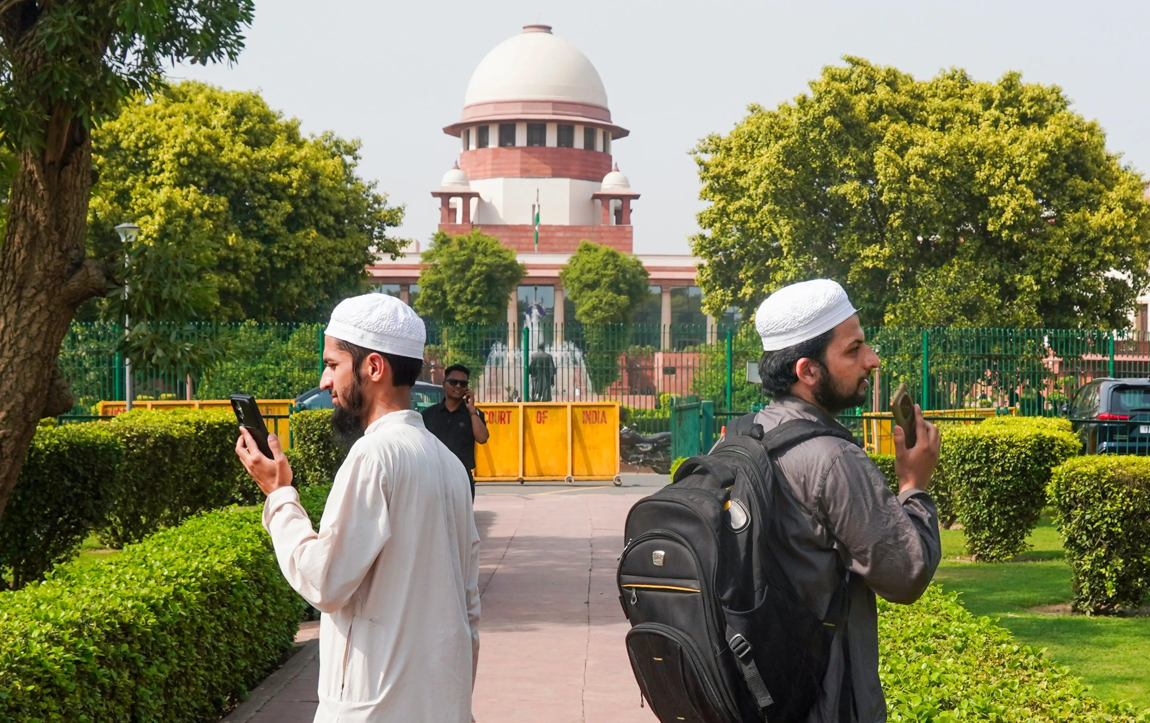 Muslim petitioners at the Supreme Court lawn during hearing on pleas challenging the Waqf Act amendments, in New Delhi.| Photo: PTI