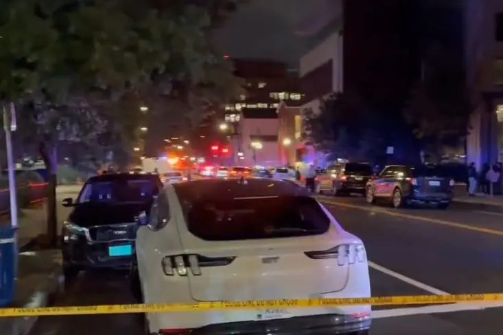 Police cordon off the area near the Capital Jewish Museum following a fatal shooting