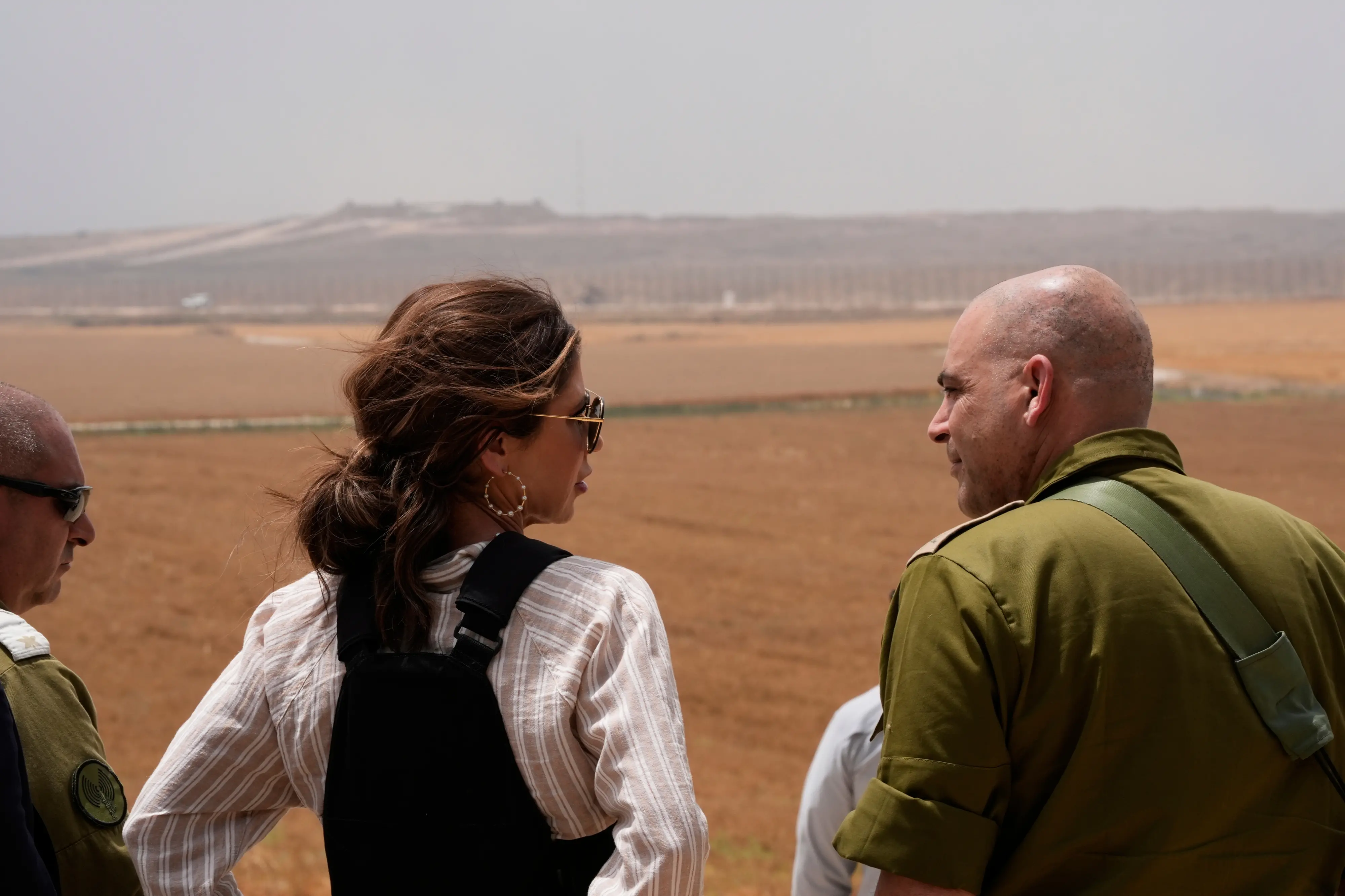 US Homeland Security Secretary Kristi Noem looks toward the northern Gaza Strip as she stands at the Black Arrow memorial site, at an overlook on the Israel-Gaza border. | Photo: AP