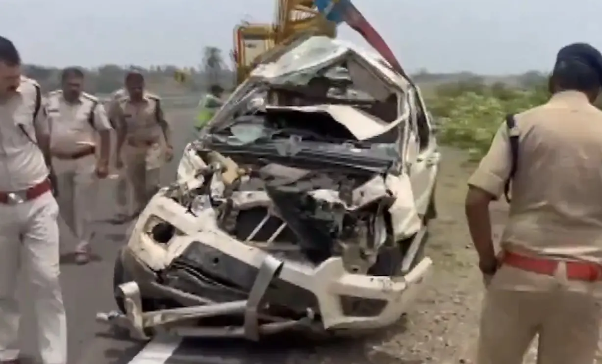 Police team inspecting the damaged car | PTI