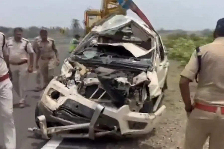 Police team inspecting the damaged car | PTI