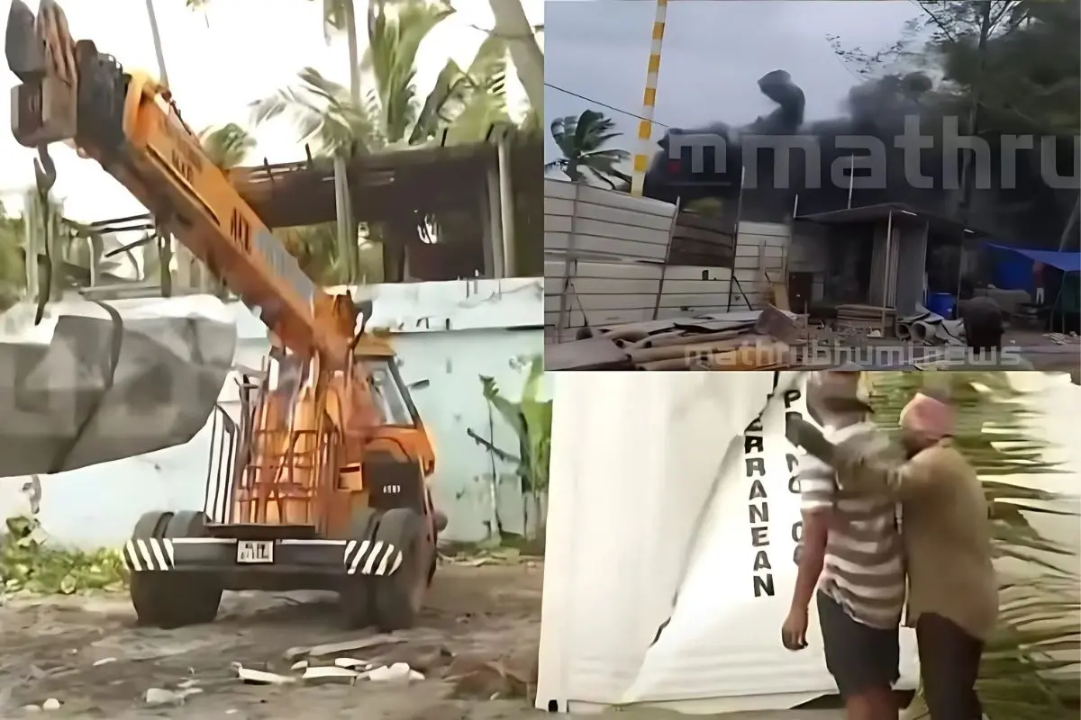 Container parts being removed from Shaktikulangara coast; Visual shows thick smoke from fire