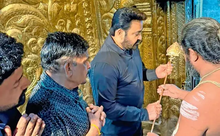 Mohanlal at the temple with the Vel