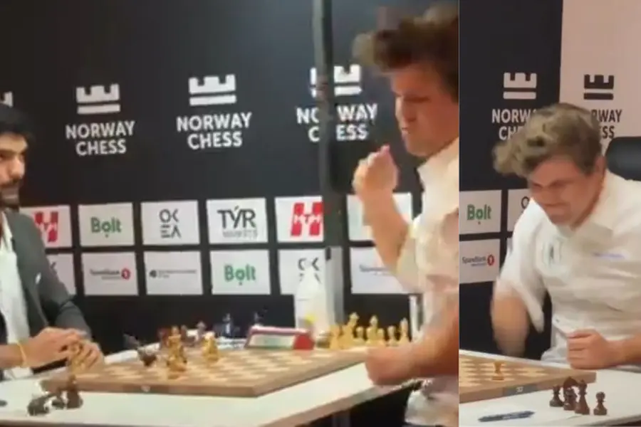Magnus Carlsen reacts after facing defeat against Gukesh