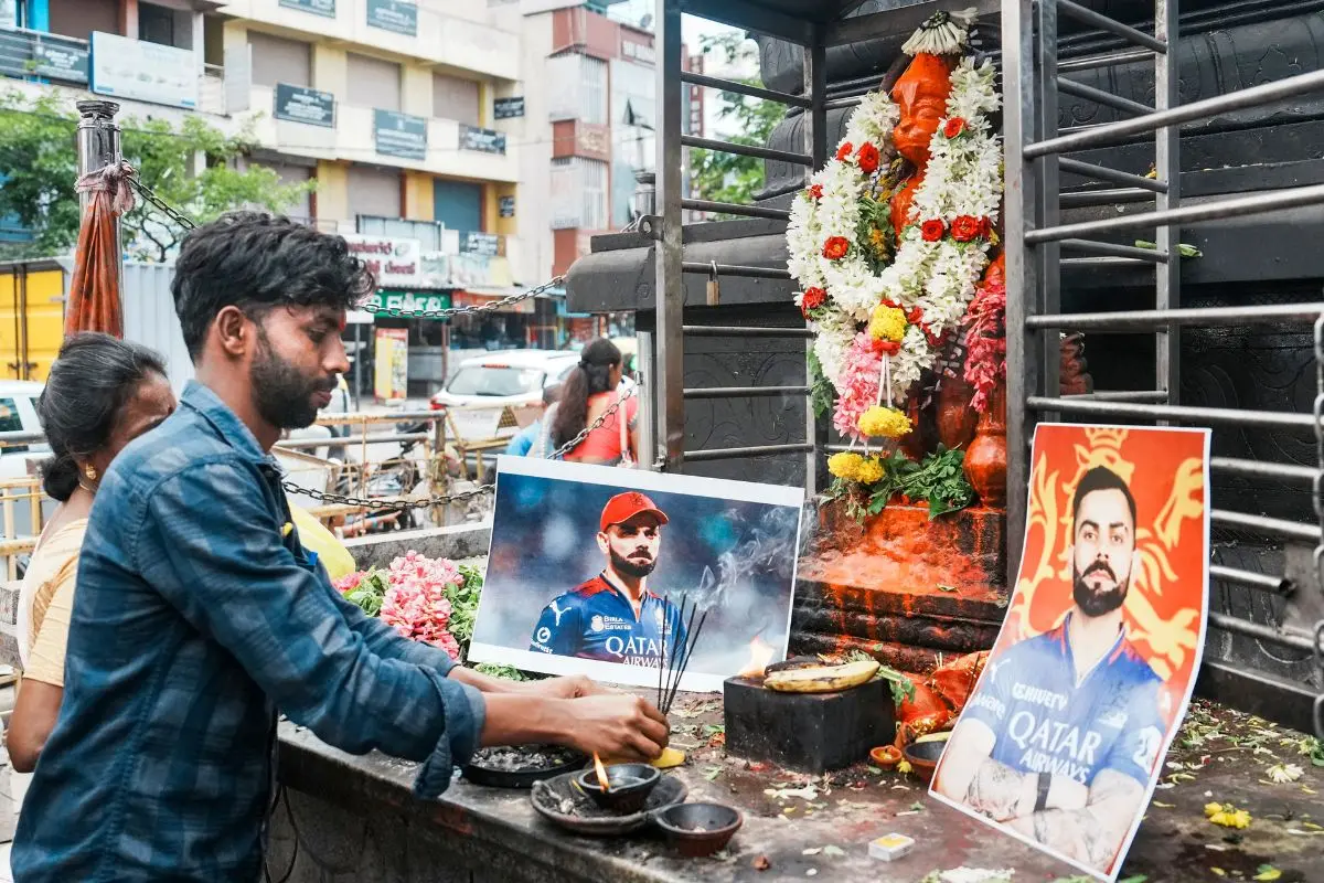 RCB fans offer prayers for the team's victory in the IPL 2025 final in Bengaluru. | Photo: PTI
