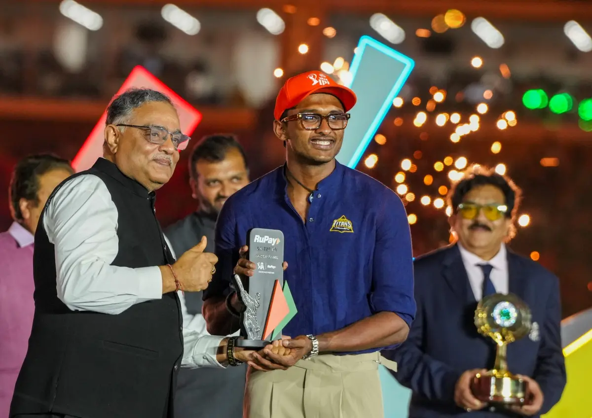Gujarat Titans' Sai Sudharsan receives an award during the presentation ceremony of the Indian Premier League (IPL) 2025, at the Narendra Modi Stadium in Ahmedabad. | Photo: PTI