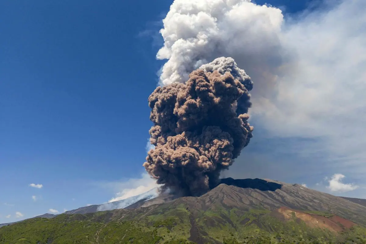 Smoke rises from the crater of the Etna volcano as it erupts, on Mount Etna near Catania