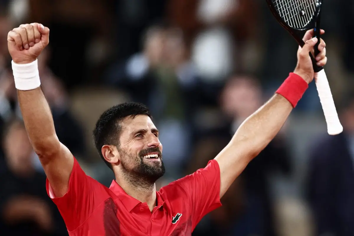 Serbia's Novak Djokovic celebrates after winning against Germany's Alexander Zverev at the end of their men's singles quarter-final match on day 11 of the French Open tennis tournament on Court Philippe-Chatrier at the Roland-Garros Complex in Paris | Photo: AFP