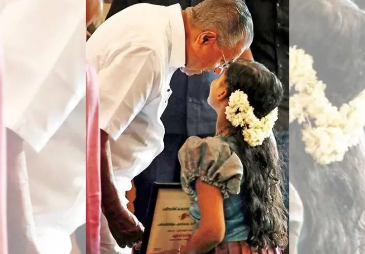 Devika receives the award from Kerala CM Pinarayi Vijayan | Mathrubhumi