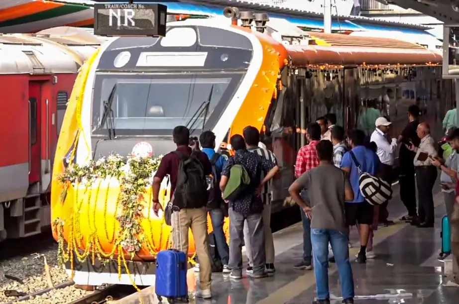 People wait as a newly-inaugurated Vande Bharat Express train arrives at a platform, at Shri Mata Vaishno Devi Katra railway station (Photo: PTI)