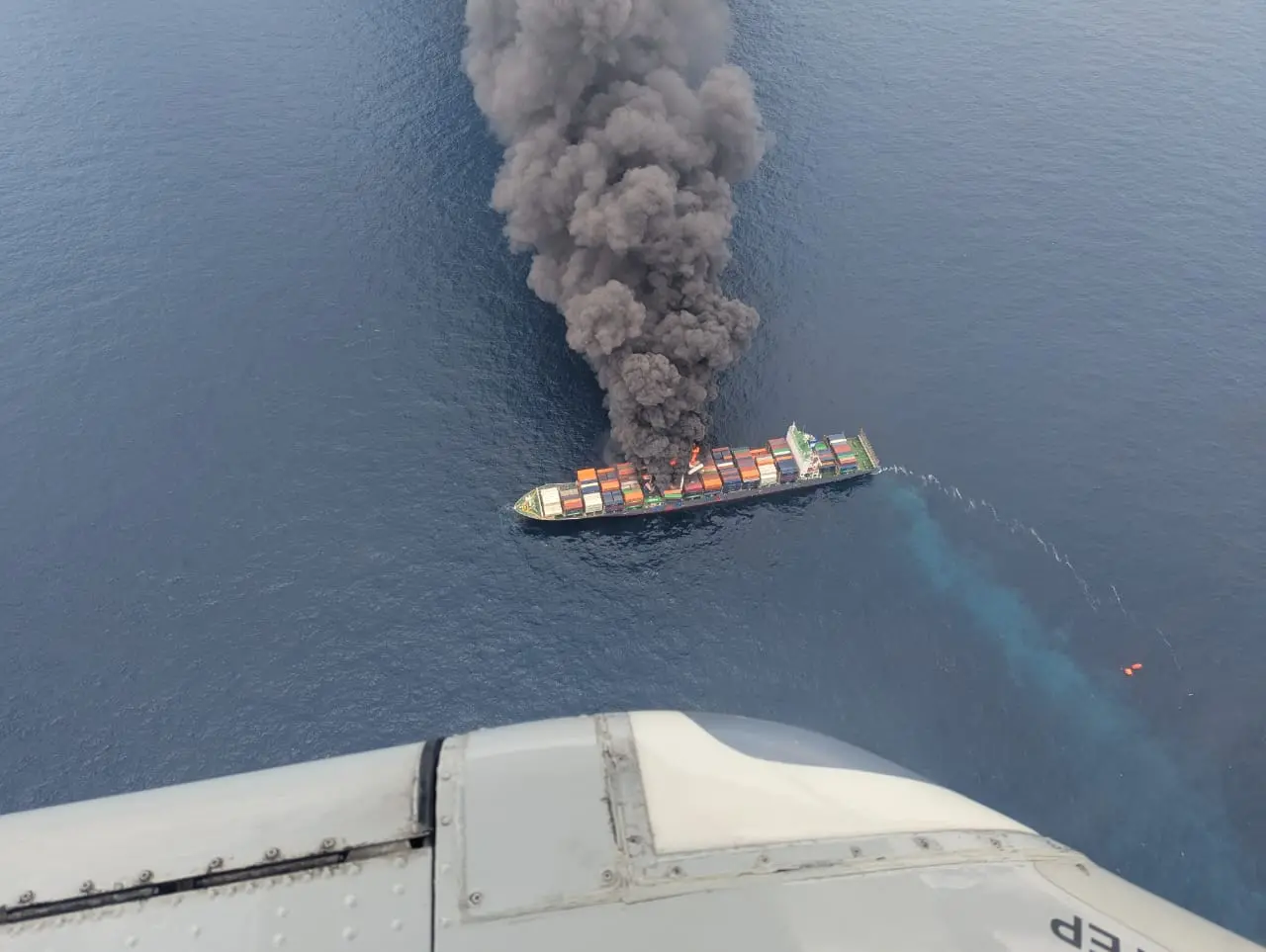 Smoke seen rising from the ship after the explosion