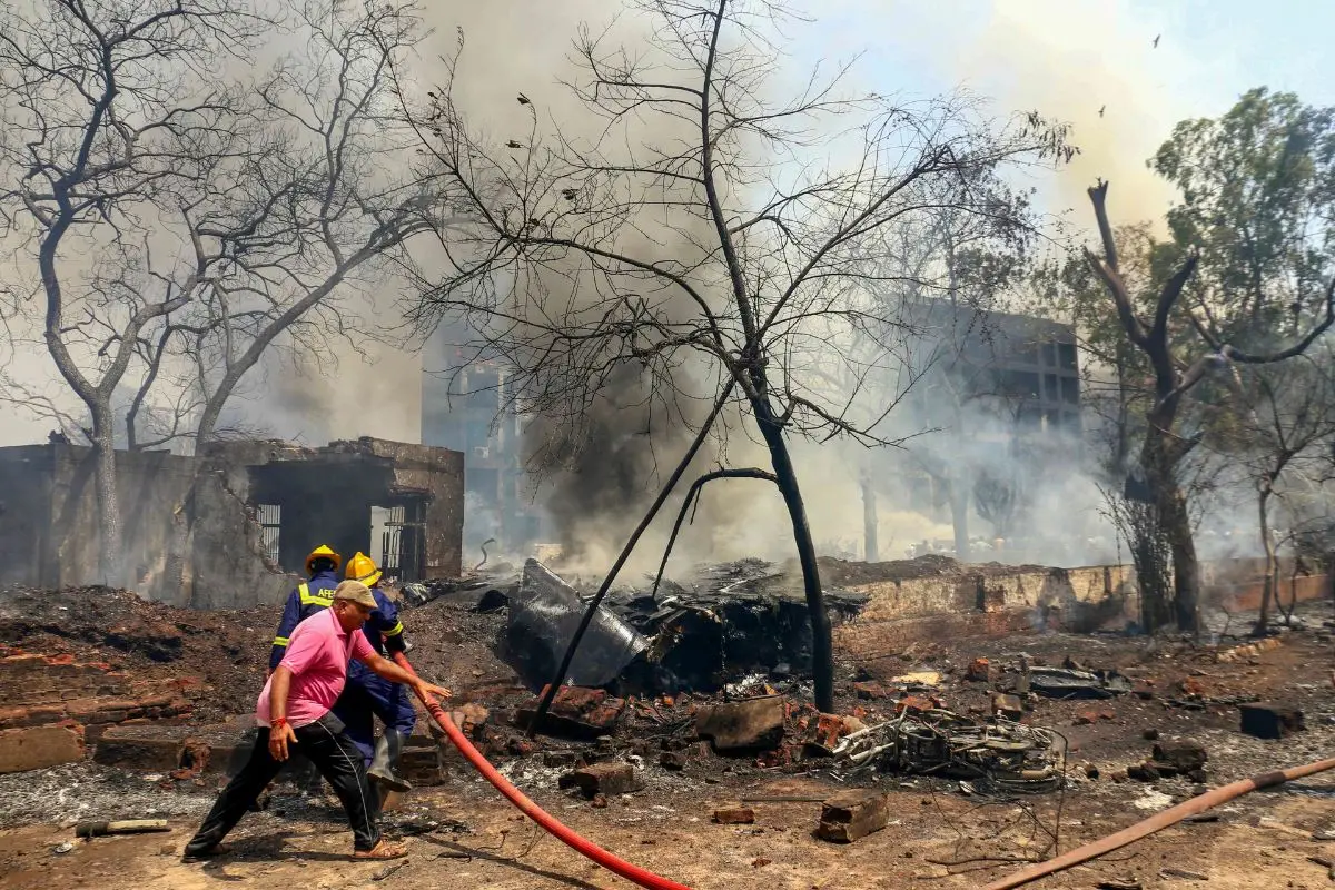 Firefighting team at the spot after a London-bound Air India plane crashed moments after taking off from the Ahmedabad airport (Photo: PTI)