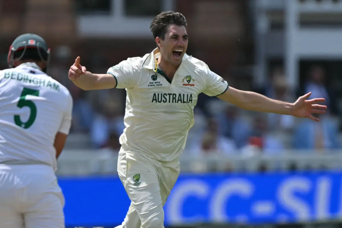 Australia's captain Pat Cummins celebrates taking the wicket of South Africa's David Bedingham on day two of the ICC World Test Championship cricket final match between Australia and South Africa, at Lord's cricket ground in London. | Photo: AFP