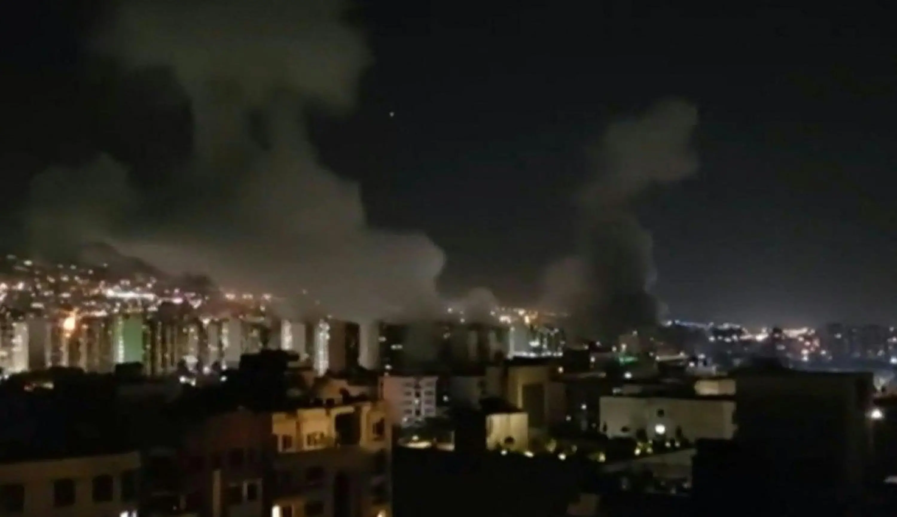 Smoke billowing from explosions in Iran | AFP