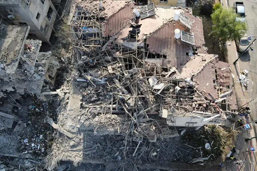 Destroyed residential buildings that were hit by a missile fired from Iran