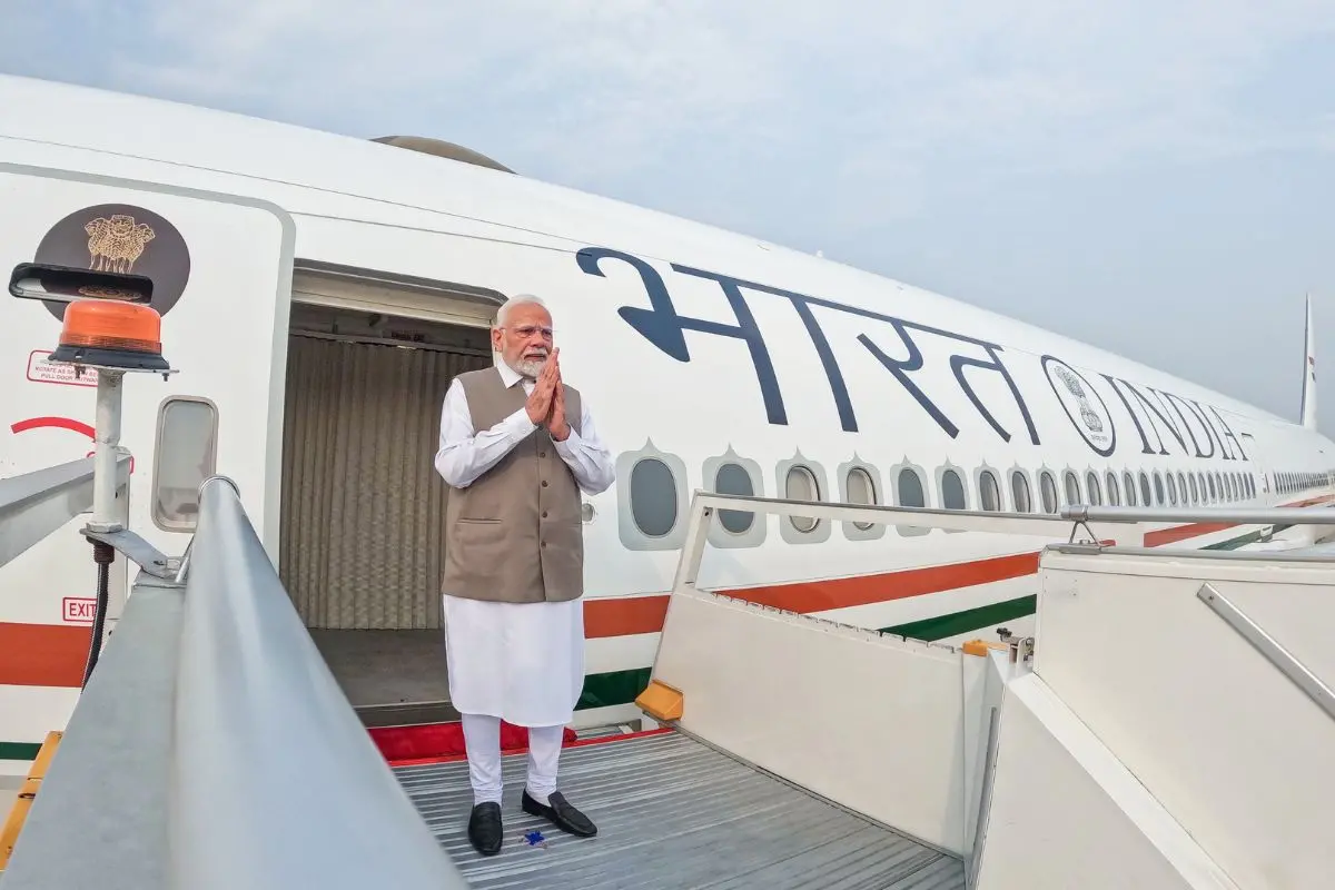 Prime Minister Narendra Modi greets as he departs for Cyprus | ANI