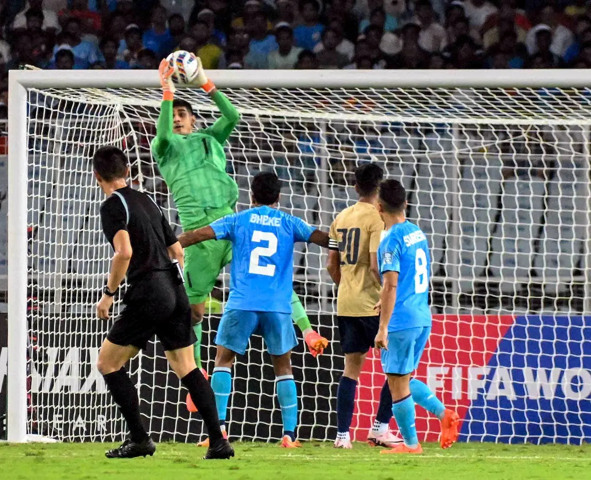 India's captain Sunil Chhetri (C) along with teammates attends a training session ahead of their preliminary joint qualification round 2 match against Kuwait for the FIFA World Cup 2026 and AFC Asian Cup, in Kolkata on June 5, 2024 | Photo: AFP