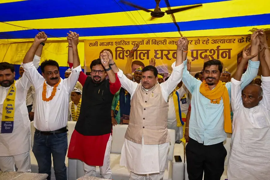 AAP leader Sanjay Singh with supporters