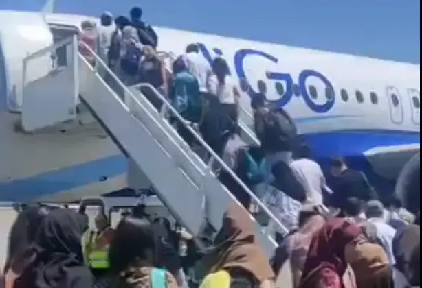 A screengrab from a video showing students boarding a flight to India | ANI