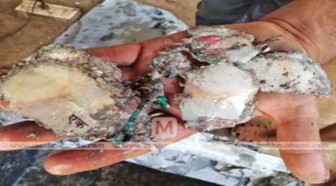 കുന്നംകുളം പെലക്കാട്ടുപയ്യൂരിൽ കിണറിൽനിന്ന് ലഭിച്ച ലോക്കറിലെ ആയിരം രൂപയുടെ അവശിഷ്ടം