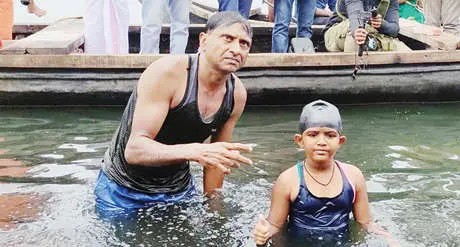 Jewel and her swimming coach Biju Thankappan