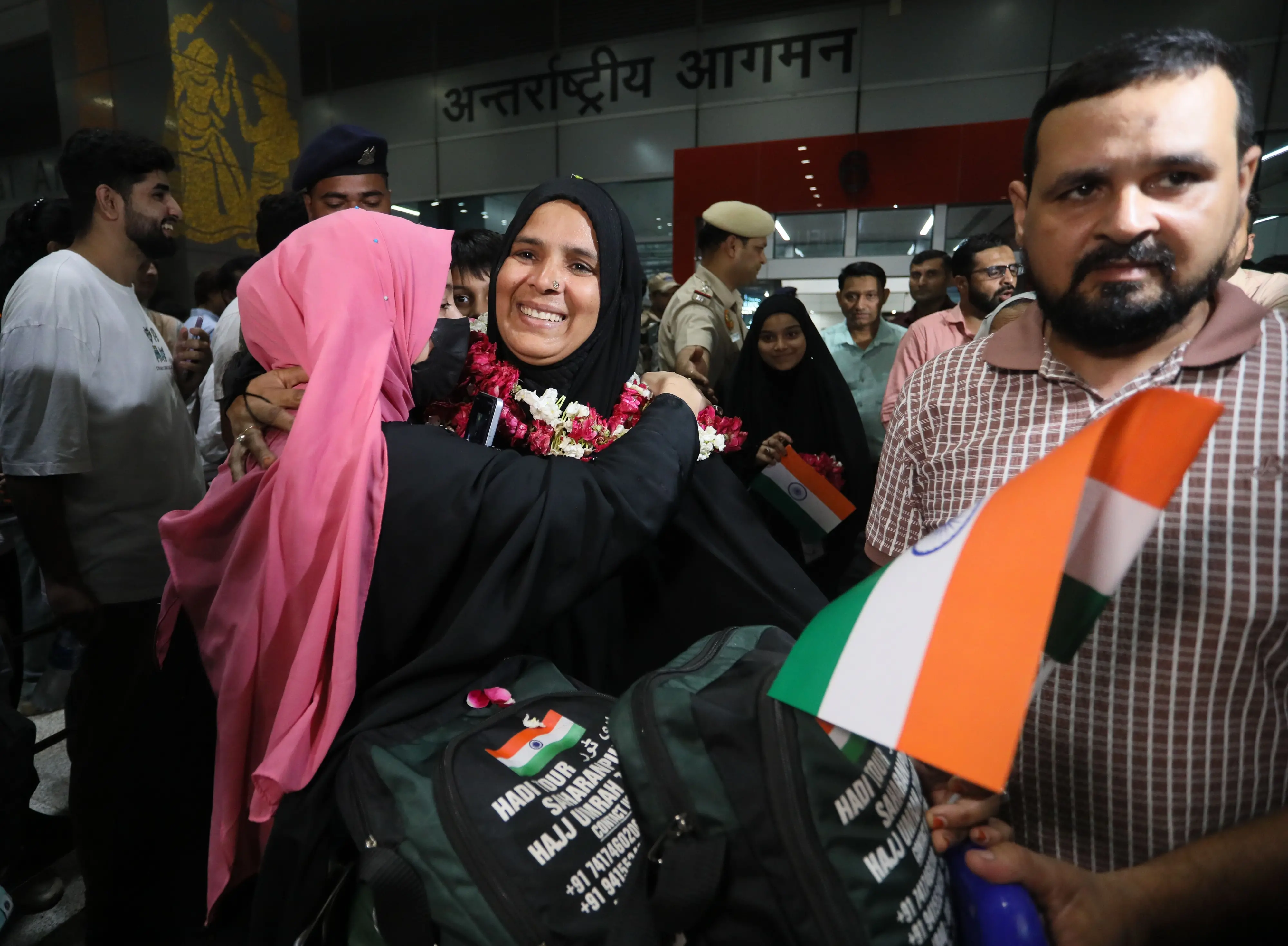 An Indian student returning from Mashhad, Iran, as part of the Operation Sindhu, reacts after meeting her relatives at the Indira Gandhi International Airport, in New Delhi. | Photo: PTI