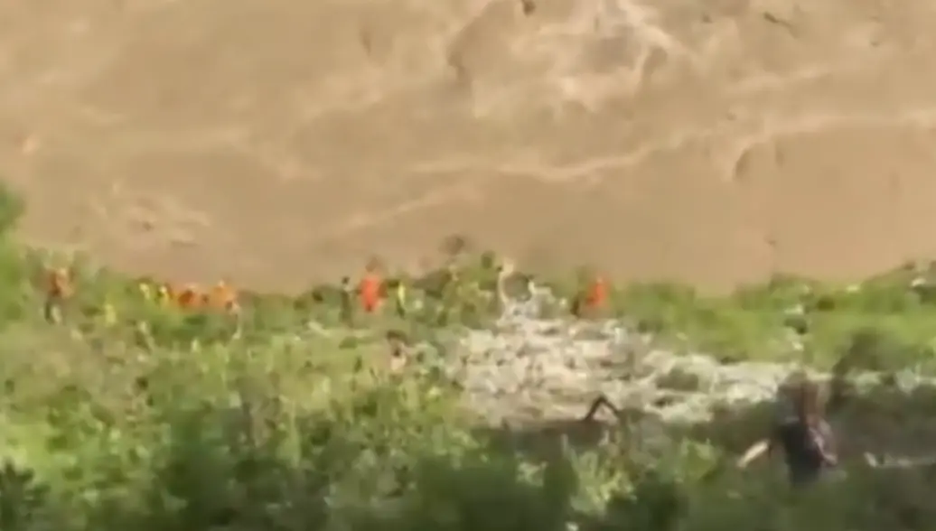 Screengrab of a video showing rescue operation underway near the river | ANI
