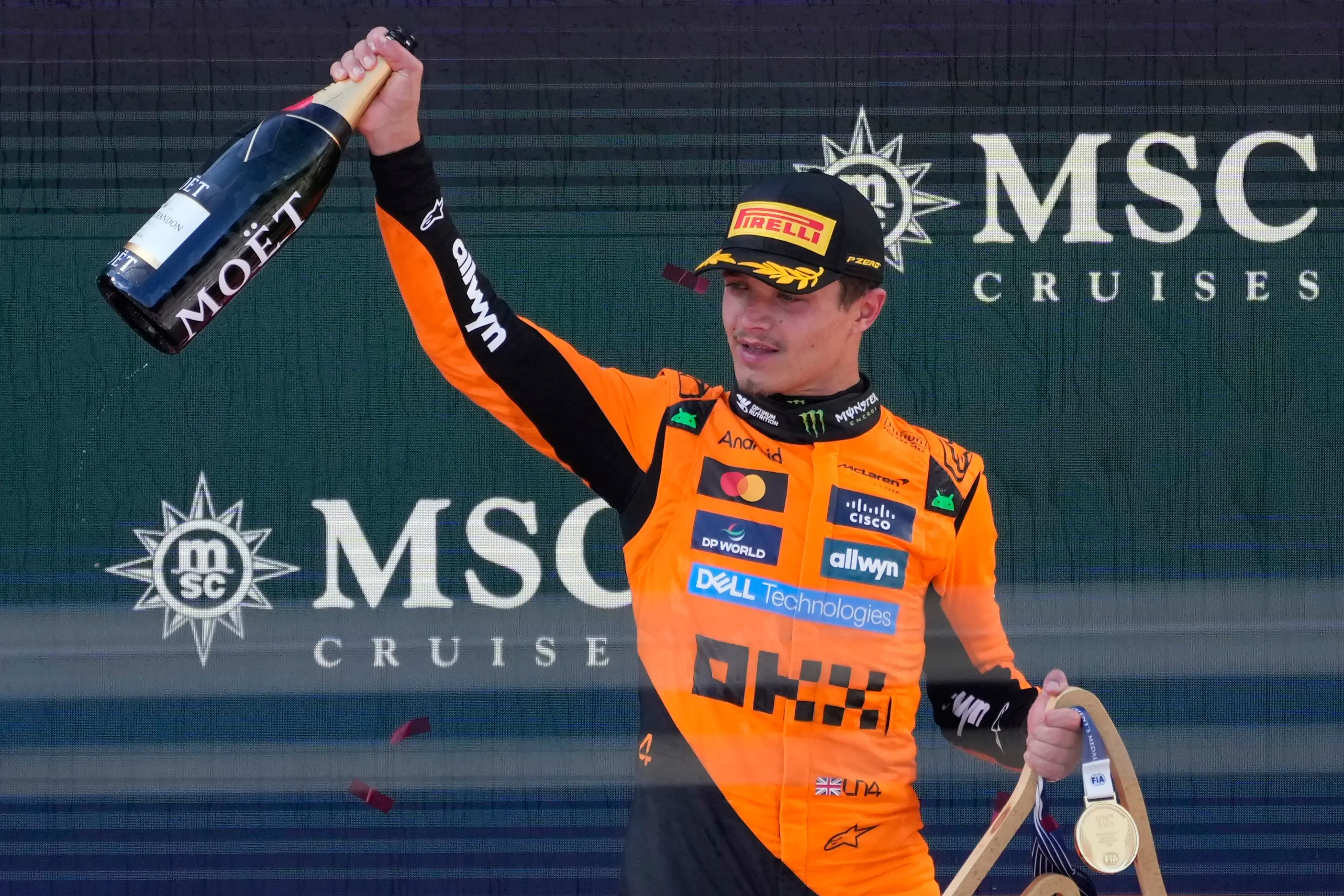 McLaren driver Lando Norris celebrates after winning the Austrian Formula One Grand Prix | Photo: AP