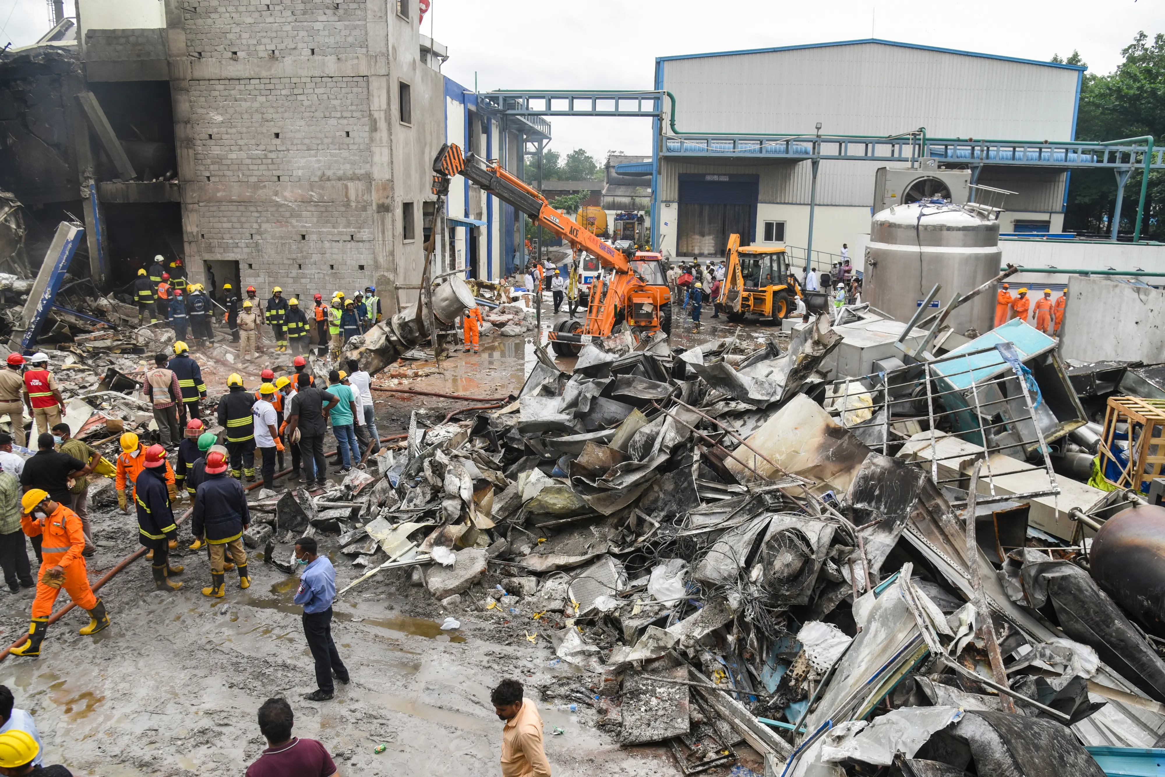 Emergency services personnel at the site after an explosion at a pharma plant, at Pashamylaram, in Sangareddy district, Telangana | Photo: PTI