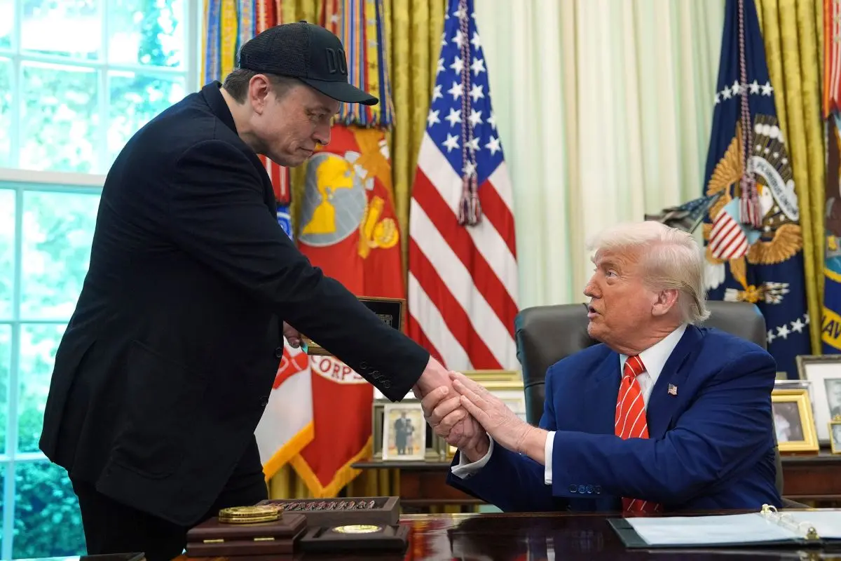 President Donald Trump, right, shakes the hand of Elon Musk during a news conference in the Oval Office of the White House (File photo: PTI/ AP)