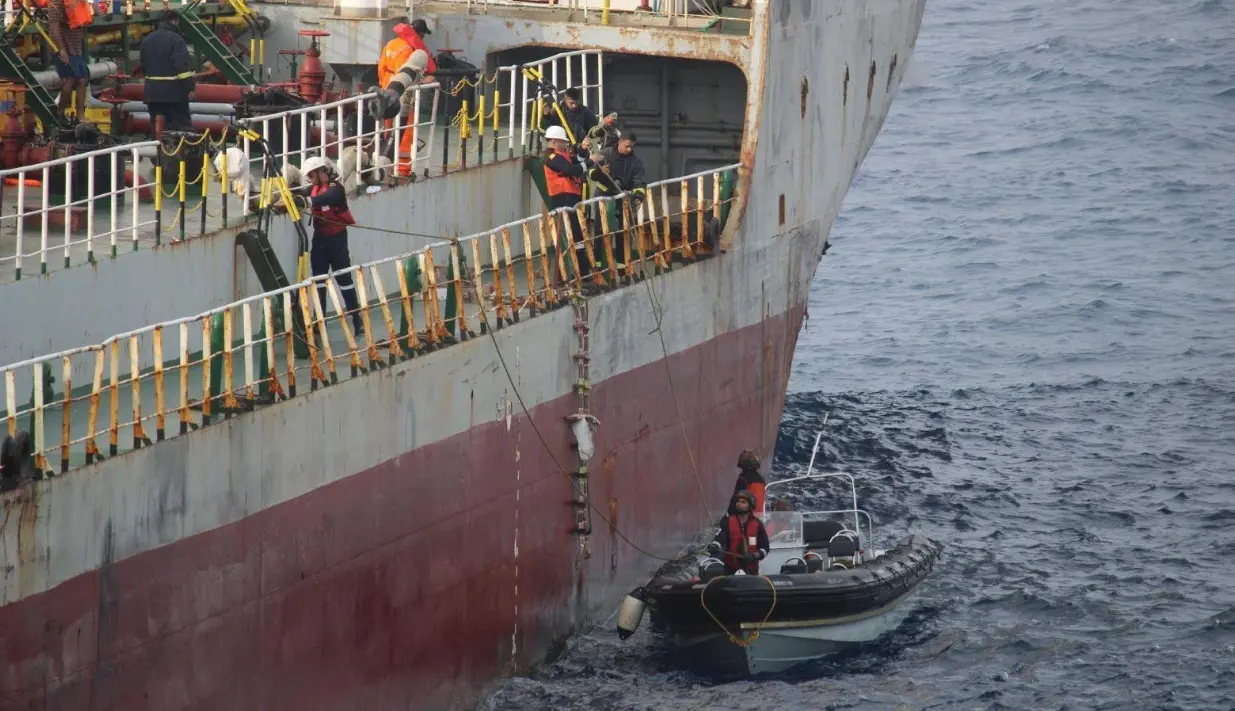 Indian Navy personnel in action during rescue operation
