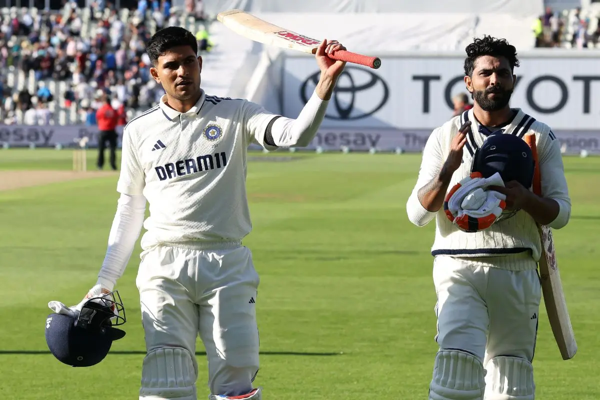 India's captain Shubman Gill (L) and India's Ravindra Jadeja leave the field at the end of play on the opening day of the second cricket test match between England and India at Edgbaston cricket ground in Birmingham, central England. | Photo: AFP