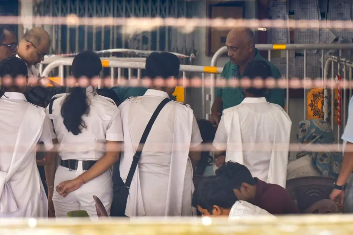 Police cordon off an area as accused in the alleged gang rape of a student of South Calcutta Law College are brought for reconstruction of the crime scene on Friday. Photo: PTI