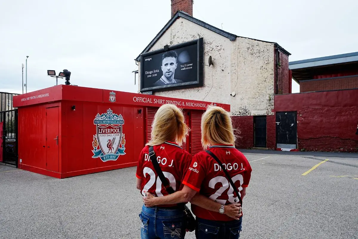 Liverpool supporters wearing shirts in memory of Diogo Jota at Anfield Stadium, home of Liverpool, who has died at the age of 28, in Liverpool, England | Photo: AP