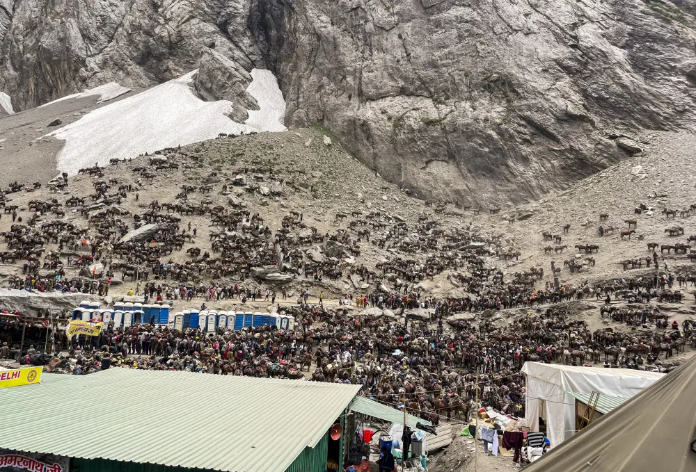 People during the annual pilgrimage to the holy cave shrine of Amarnath, at Baltal in Ganderbal district, Jammu & Kashmir | PTI