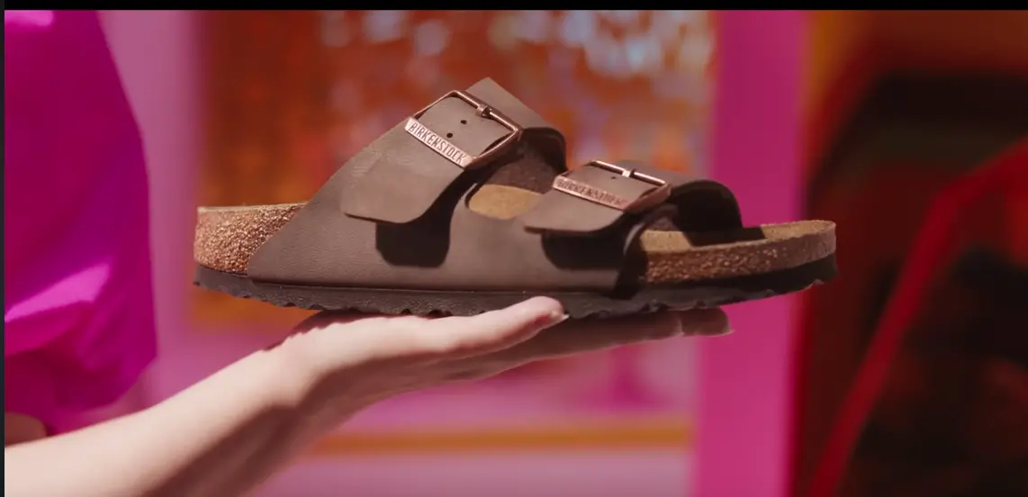 The pair of Birkenstocks that Barbie is urged to choose in the trailer of the film | Photo: WarnerBros./ YouTube