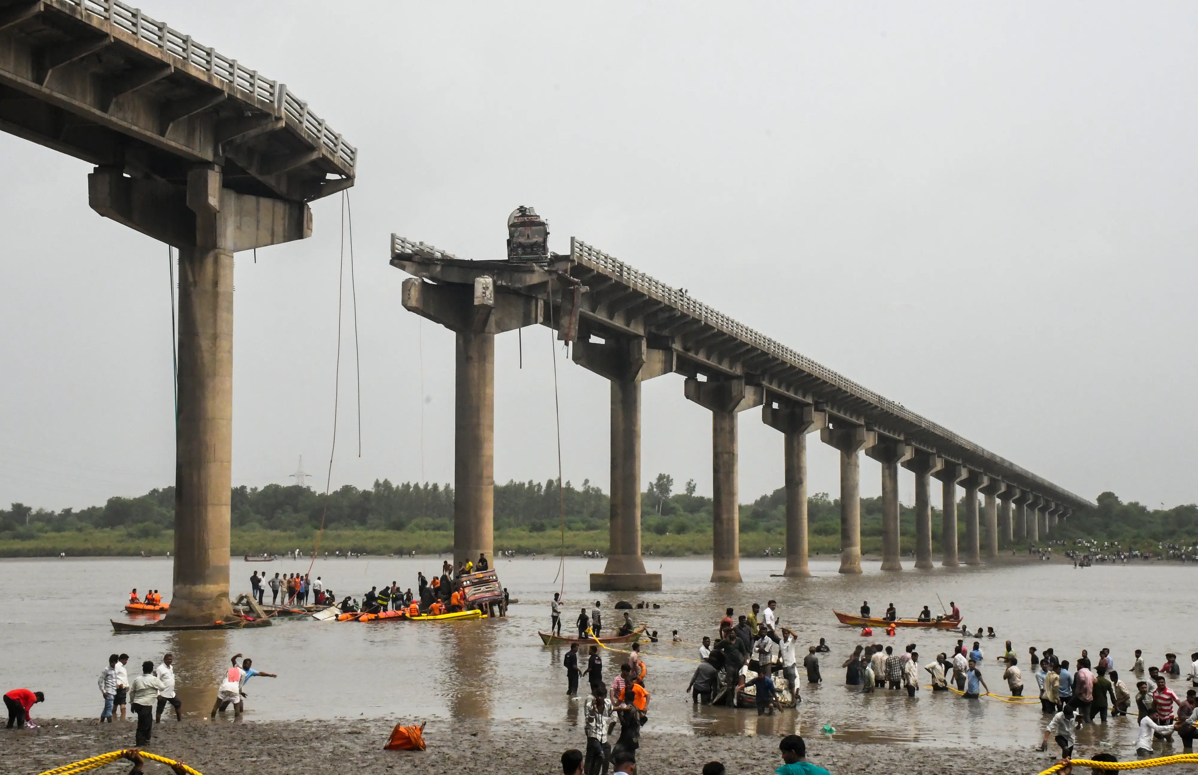 Rescue operation underway after several vehicles fell into the Mahisagar river when a portion of a four-decade-old bridge collapsed, in Gujarat's Vadodara district