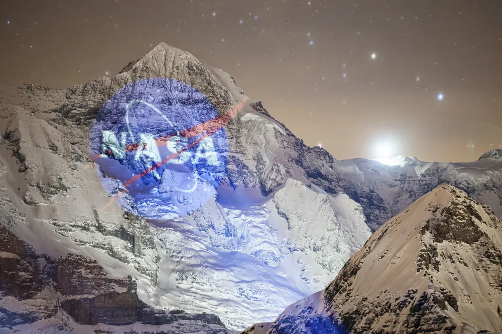 A giant projection of the NASA logo on the north face of the Eiger mountain, by Swiss light artist Gerry Hofstetter | AP File