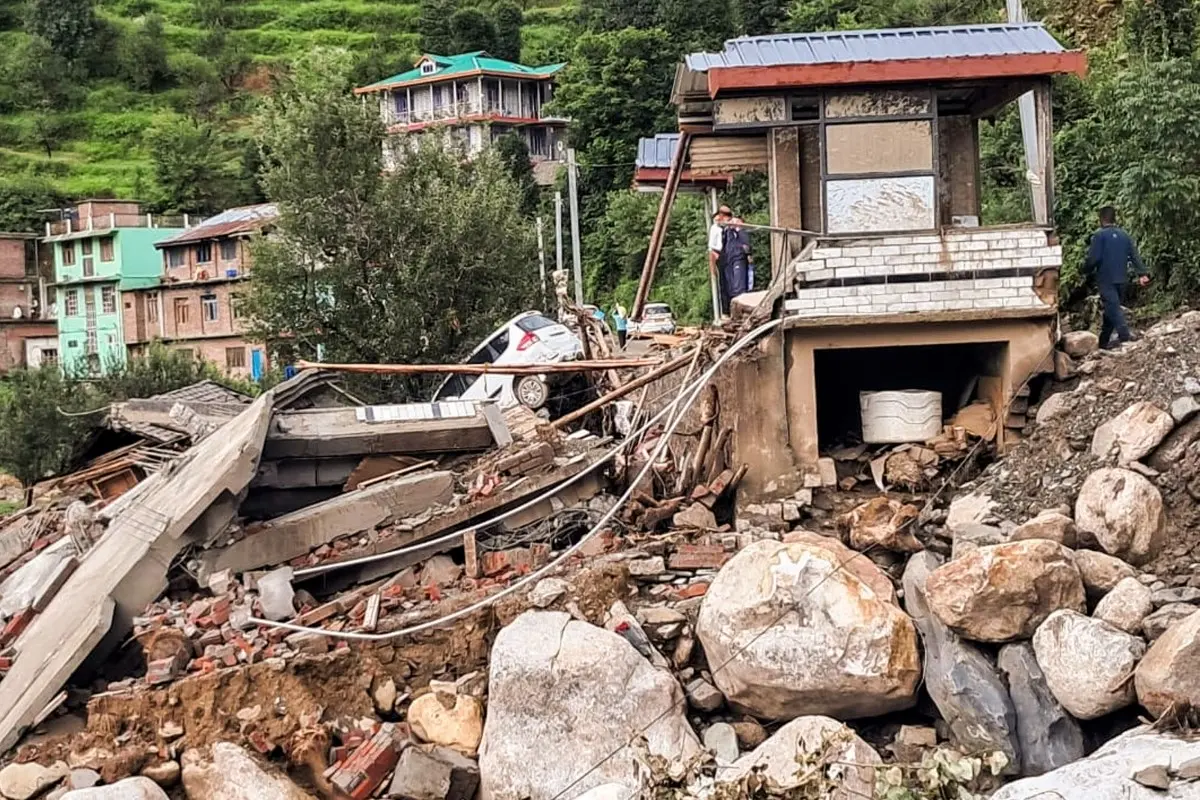 A view of the damaged houses and vehicles at the cloudburst-affected area | Photo- ANI