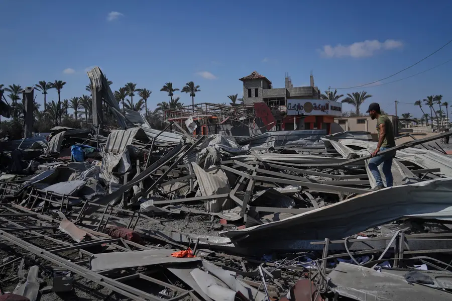 Israeli airstrikes and gunfire kill 52 Palestinians in central and southern Gaza