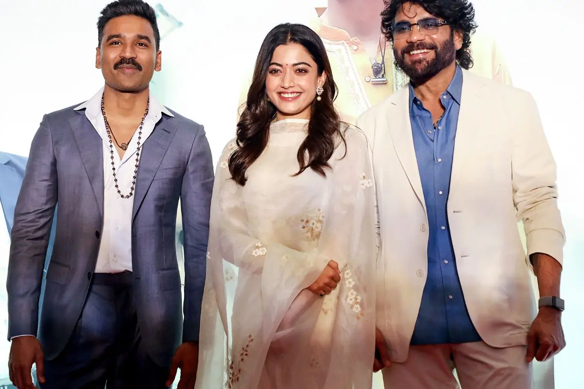 Actors Dhanush, Rashmika Mandanna and Nagarjuna pose for a picture during a song launch event of their movie 'Kuberaa' in Mumbai. | Photo: ANI
