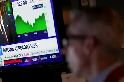 Wall Street holds near record highs amid uncertainty over Trump’s tariff plans