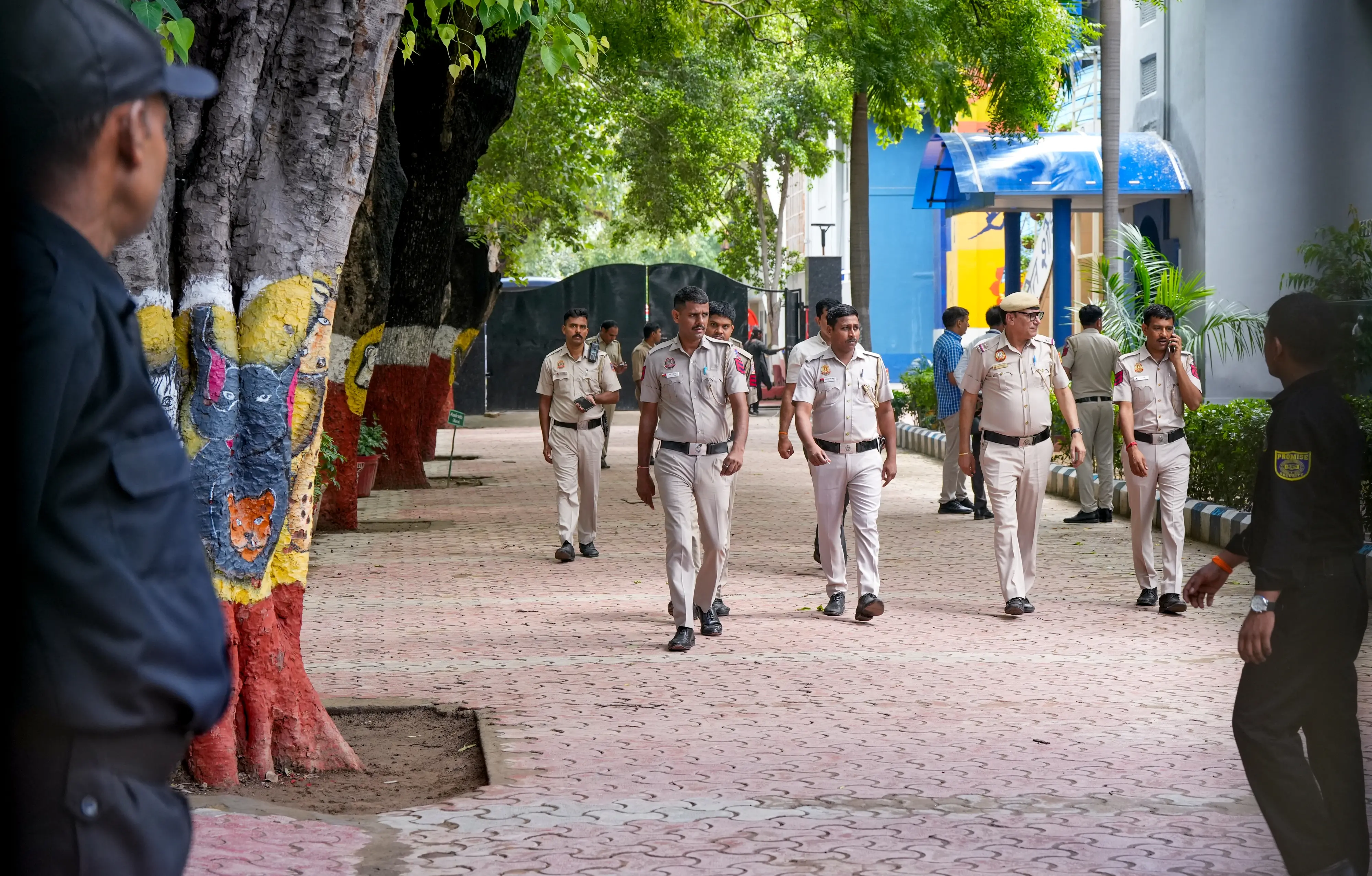 Police personnel keep a vigil at the premises of the Navy Children School after a bomb threat, at Chanakyapuri area, in New Delhi, July 14. | Photo: PTI